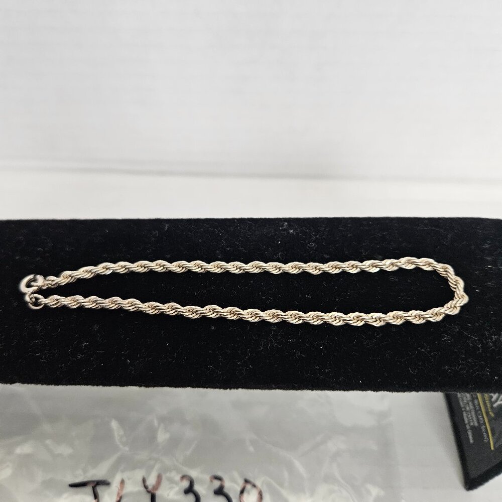 SILVER TONED BRAIDED BRACELET